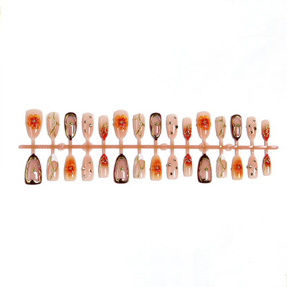Nail art set with floral accents and glitter elements Acalora