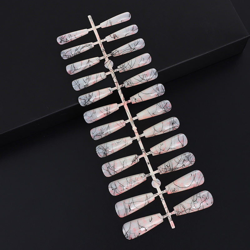 Creative nail art with blood splatter design Acalora