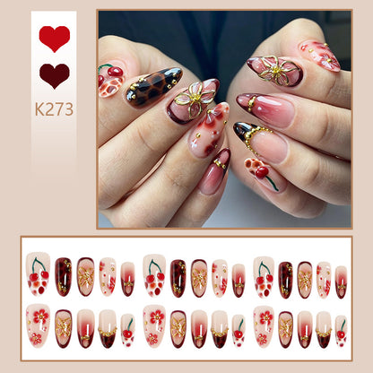 Artificial nail set with elegant floral designs and glitter effect Acalora