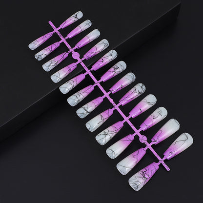 Artificial nails in modern ombre design with marbled accents Acalora