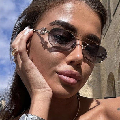 Women's elegant oval sunglasses with luxurious metal frame Karnz