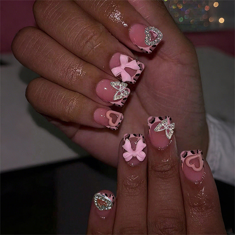 Decorative Press-On Nail Set with Artistic Bow and Heart Accents Acalora