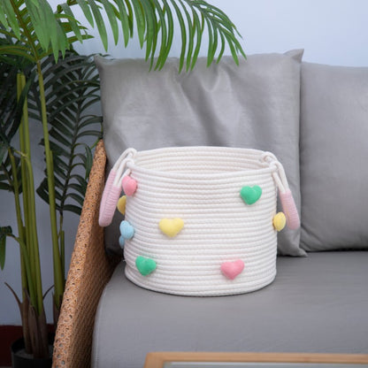 Playful storage basket with heart pattern
