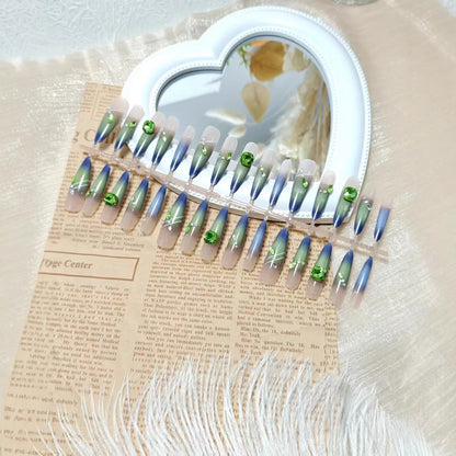 Artificial nails with elegant gradient color and glitter accents Acalora
