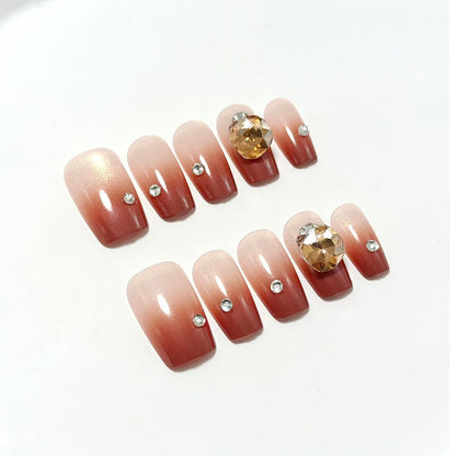 Artificial nail set with glittering rhinestone applications Acalora
