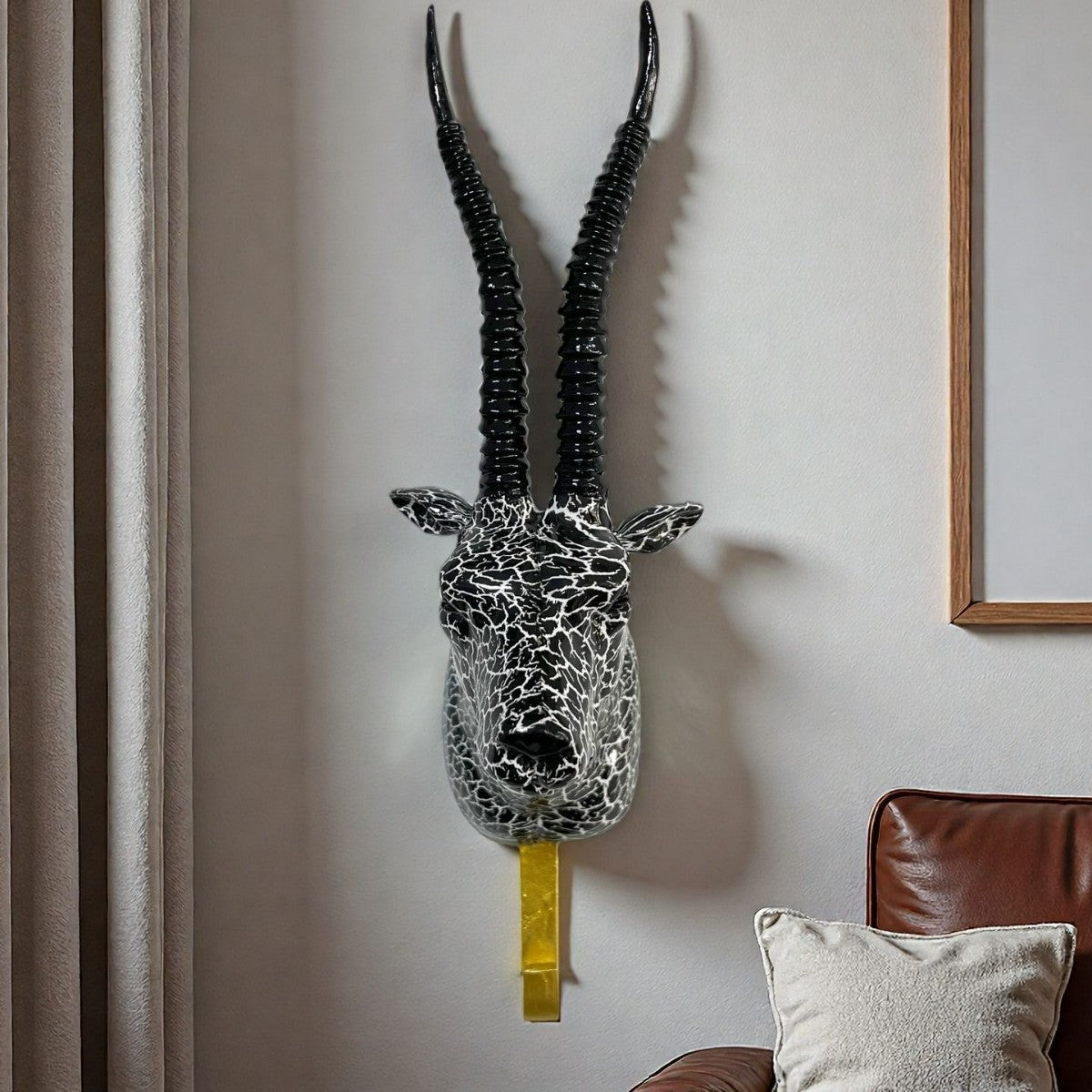 Wall hooks in the shape of a stylized unicorn Acalora