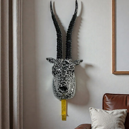 Wall hooks in the shape of a stylized unicorn Acalora