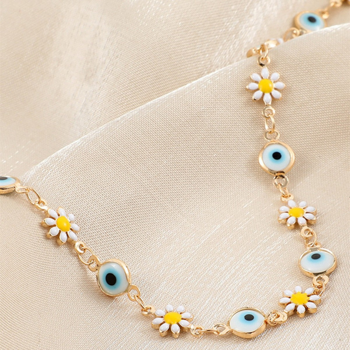 Flower and Eye Charm Bracelet Acalora