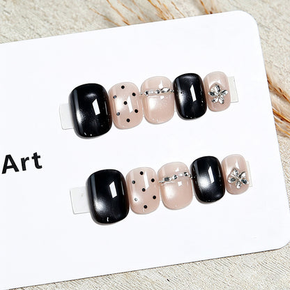 Acrylic nail set with glamorous accents and delicate designs Acalora