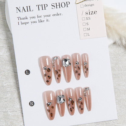 Glamorous artificial nail set with fun leopard pattern and glittering accents Acalora