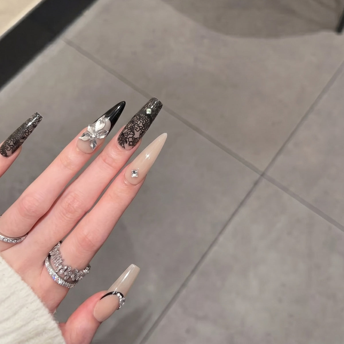 Artistic Stiletto Press-On Nail Set with Floral and Geometric Accents Acalora