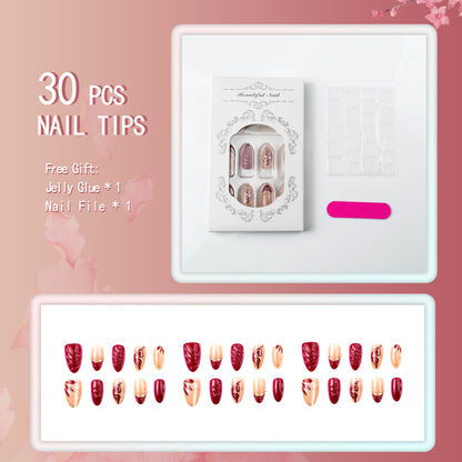 Artificial nail set with filigree golden decorations and romantic heart details Acalora