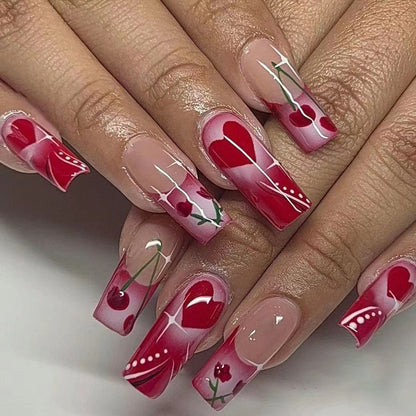Artificial nails with romantic heart design and fine accents Acalora