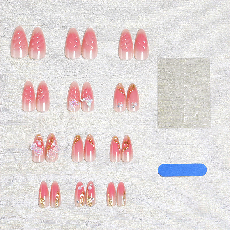 Artificial nail creation with floral 3D details and glitter accents Acalora