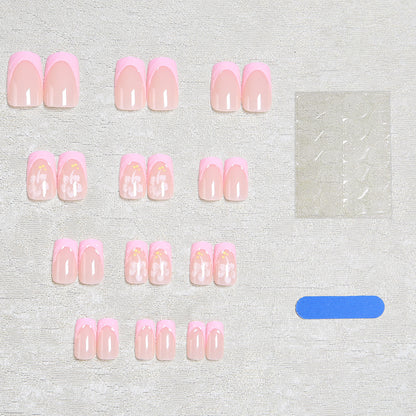 Artificial nail set with floral applications and elegant accents Acalora