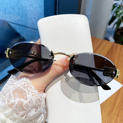 Women's fashionable sunglasses in an elegant oval design Karnz
