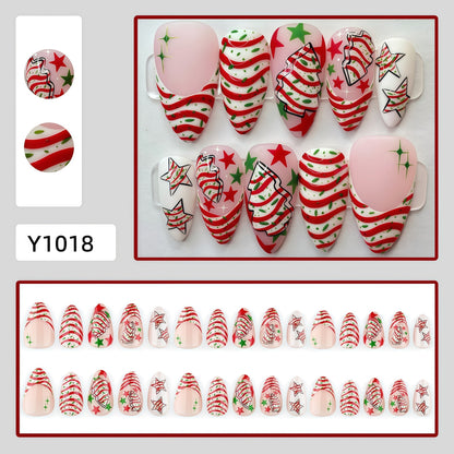 Artificial nails in festive Christmas design with colorful accents Acalora