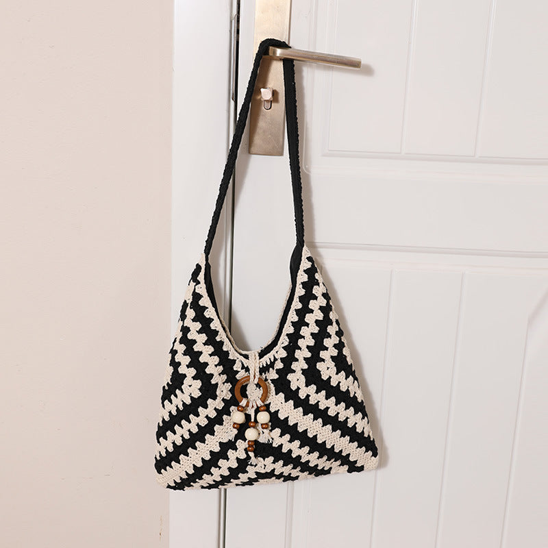Women's handbag with intricate woven pattern Karnz