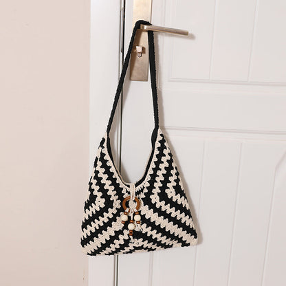 Women's handbag with intricate woven pattern Karnz