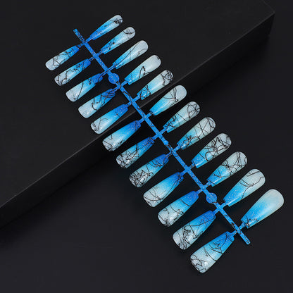 Artificial nails in modern ombre design with marbled accents Acalora