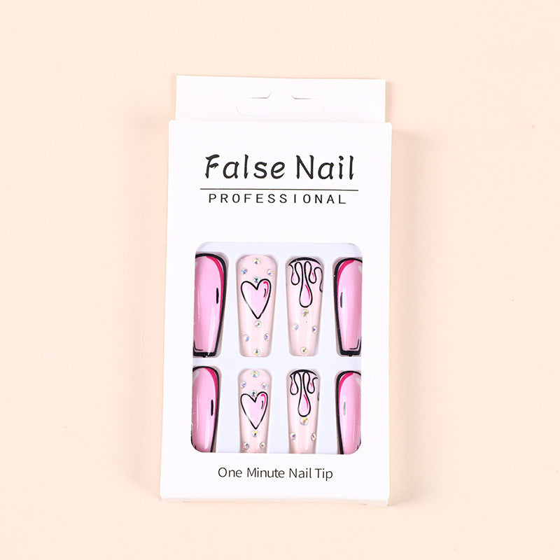 Eye-catching artificial nails with soulful heart design and glamorous accents Acalora