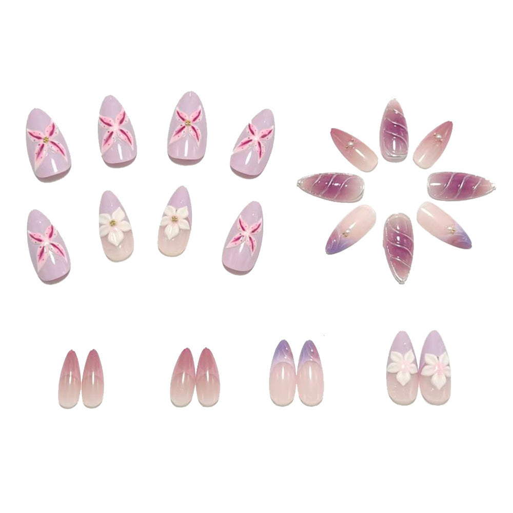 Artificial nails in elegant stiletto design with floral accent Acalora