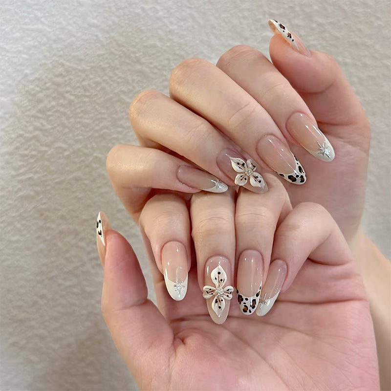 Art Nail Set with unique floral decorations and elegant design Acalora