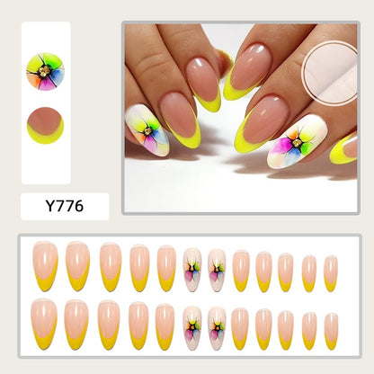 Artificial nails with colorful floral designs and striking color accents Acalora
