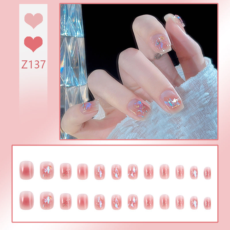 Nail set with sparkling 3D applications and romantic elements Acalora