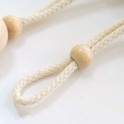 Elegant curtain holder with wooden beads Acalora