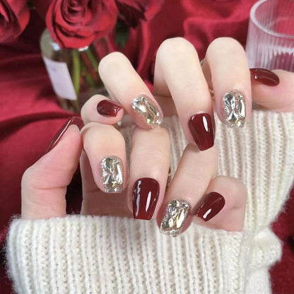 Artificial nail set with elegant glitter and metallic accents Acalora
