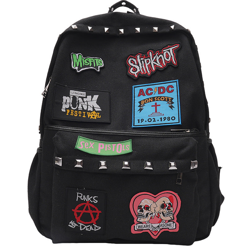 Punk-Inspired Graphic Patch School Backpack Bowlift