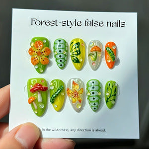 Artificial nails in forest style with floral and mushroom-shaped designs Acalora