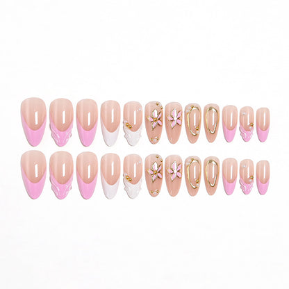 Artificial nail set with elegant floral designs and glamorous 3D applications Acalora