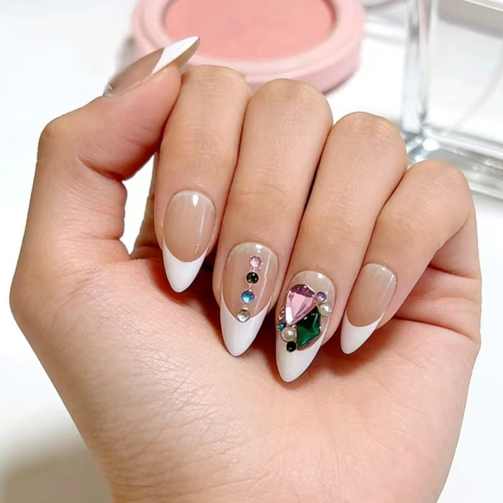 Artificial nails in a playful flower design with glittering accents Acalora
