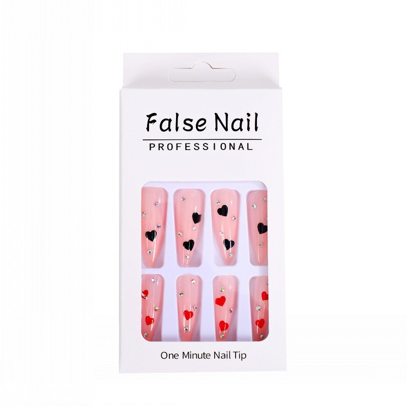 Glamorous artificial nails with heart accents Acalora