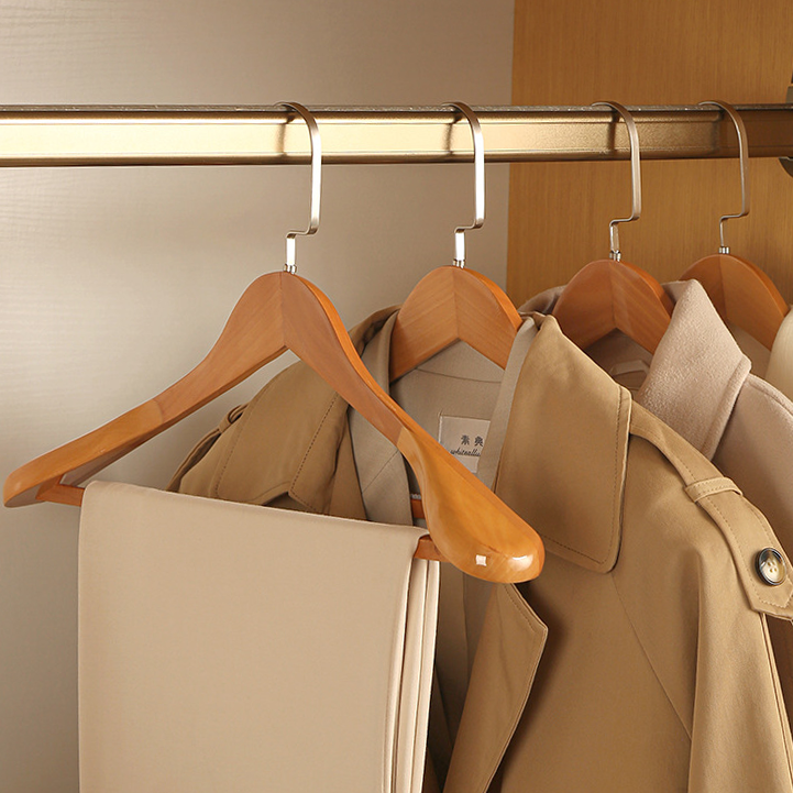 Luxurious wooden clothes hangers with a curved design
