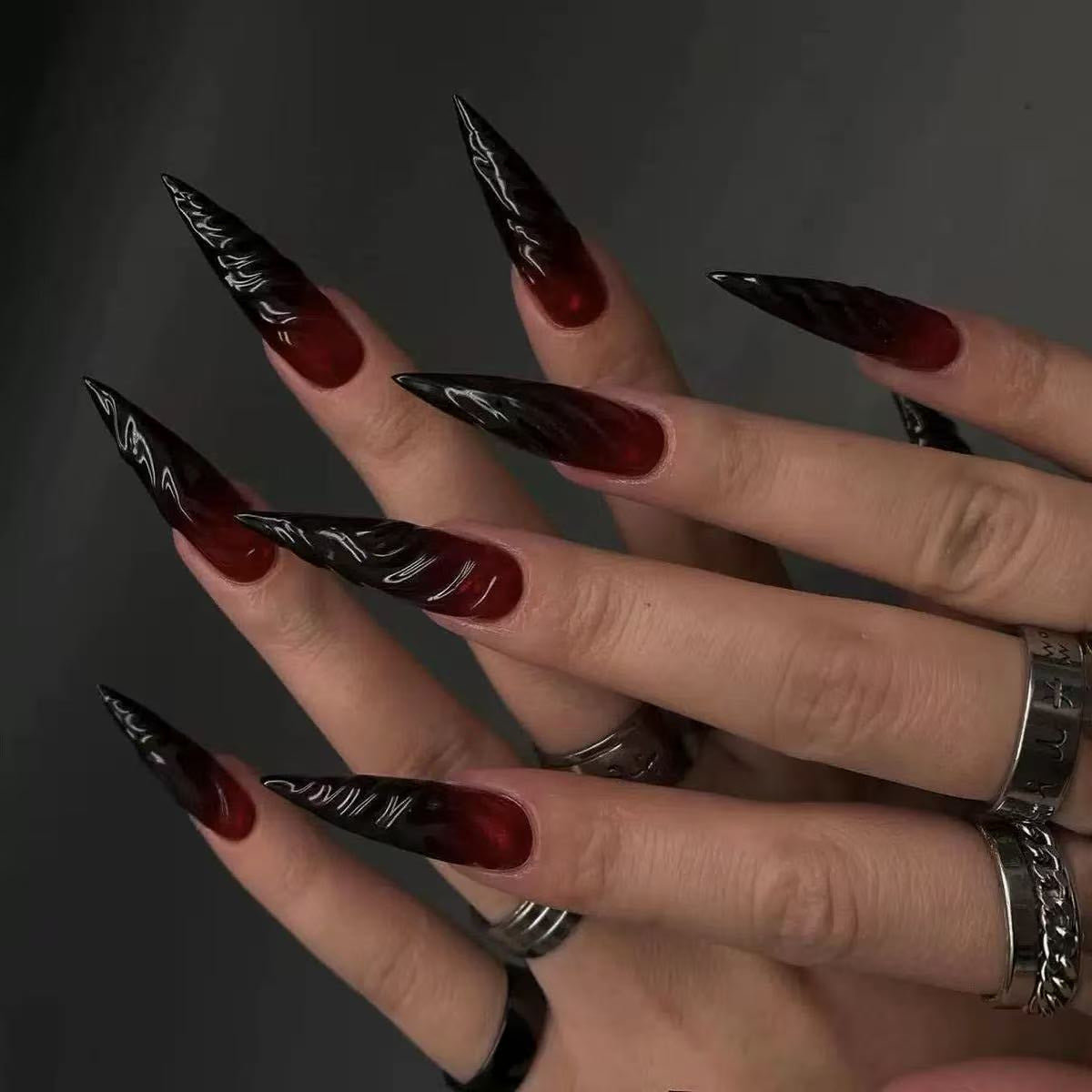 Gothic-style artificial nails with pointed tips and shiny surface Acalora