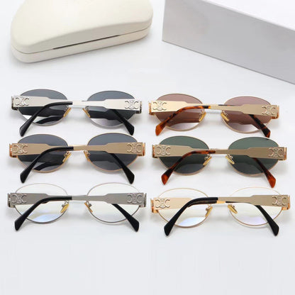 Women's elegant oval sunglasses with gold-colored frame Skanto