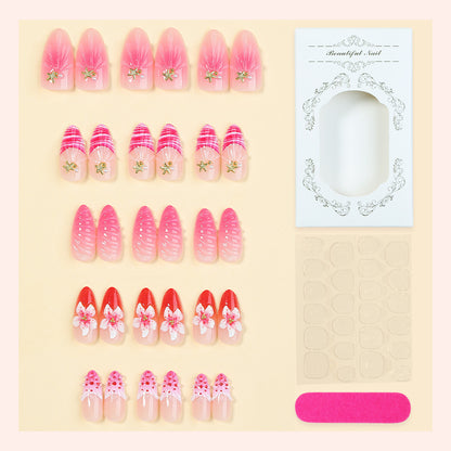 Artistic Press-On Nail Set with Floral and Decorative Accents Acalora