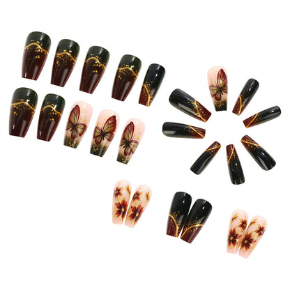 Artificial nails with elaborate butterfly and flower designs Acalora