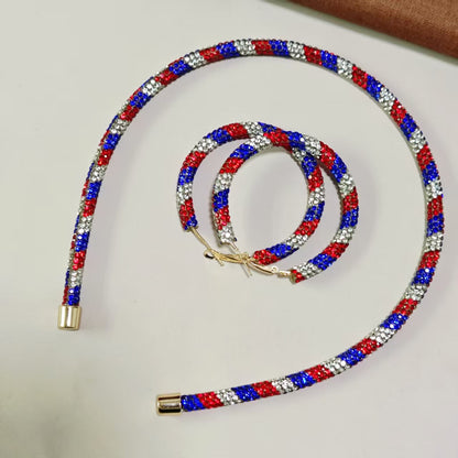 Women's handcrafted crystal pavé hoop earrings with curved tube element and clasp closure Bowlift
