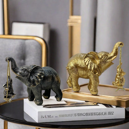 Decorative elephant figure with child Acalora