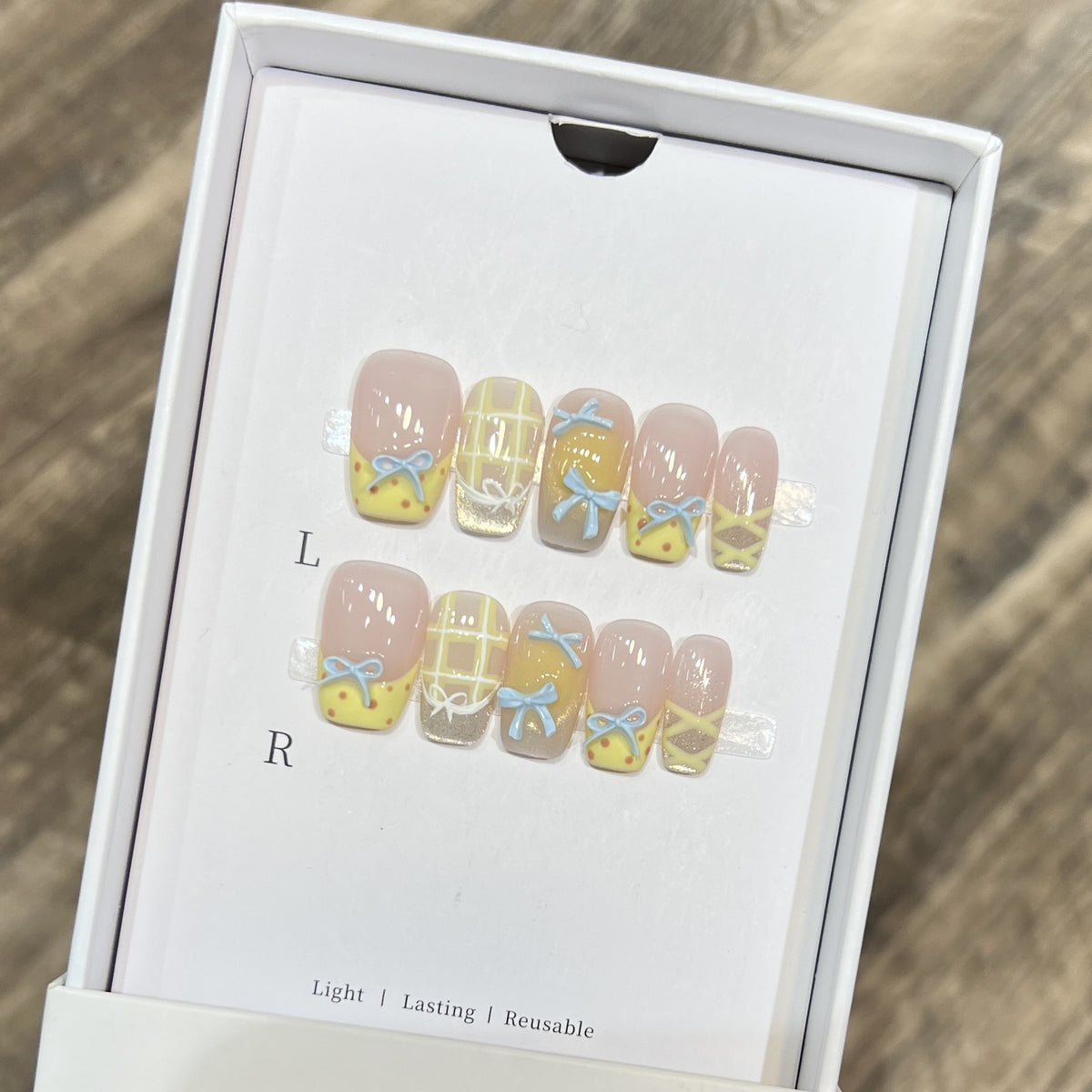 Decorative Press-On Nail Art Set with Charming Bow and Pattern Designs Acalora