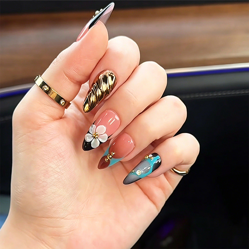 Artificial nail set with filigree floral decorations and glamorous accents Acalora