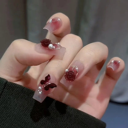 Nail art set with elegant 3D flower and butterfly decorations Acalora