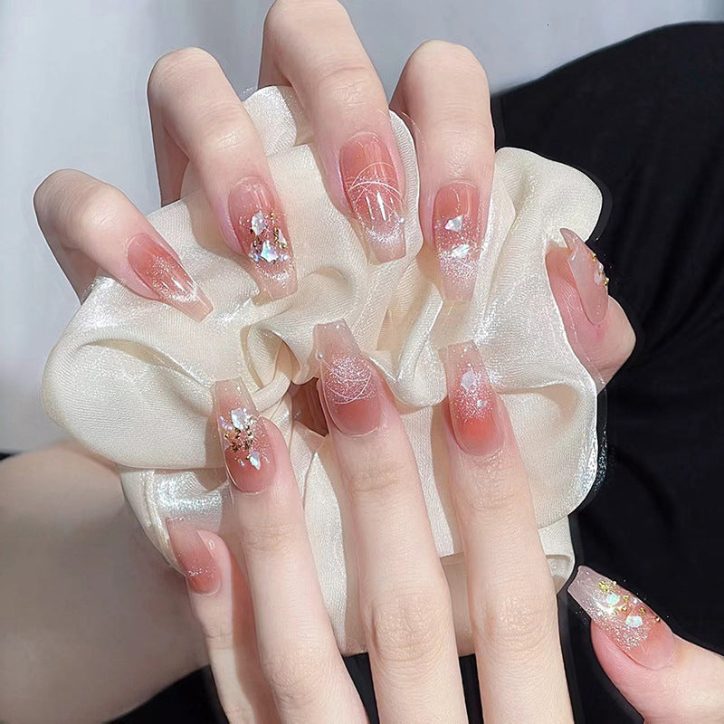 Artificial nail set with elegant glitter and flower decorations Acalora