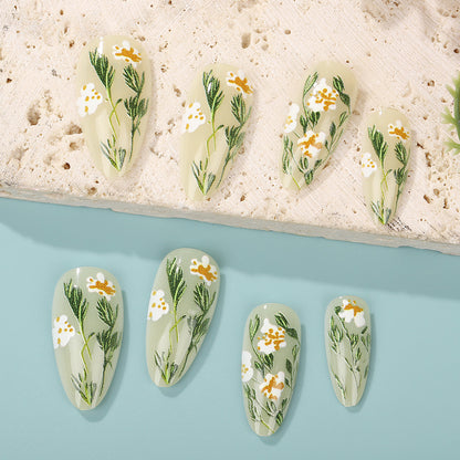 Handmade art nails with floral accents Acalora
