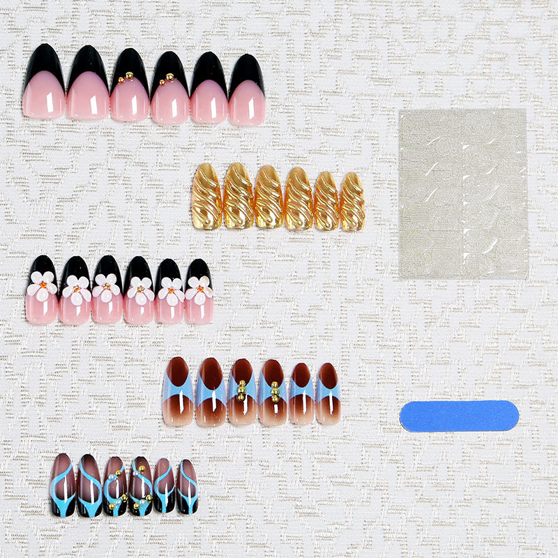 Artificial nail set with filigree floral decorations and glamorous accents Acalora