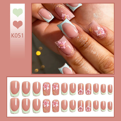 Artificial nail set with floral motifs and shiny accents Acalora